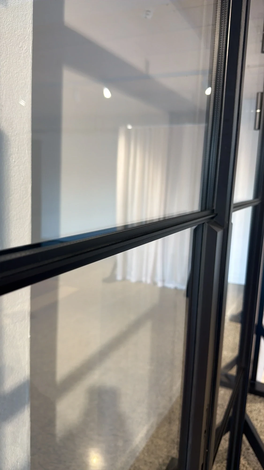 Flat T divider bar — horizontal astragal across double-glazed pane