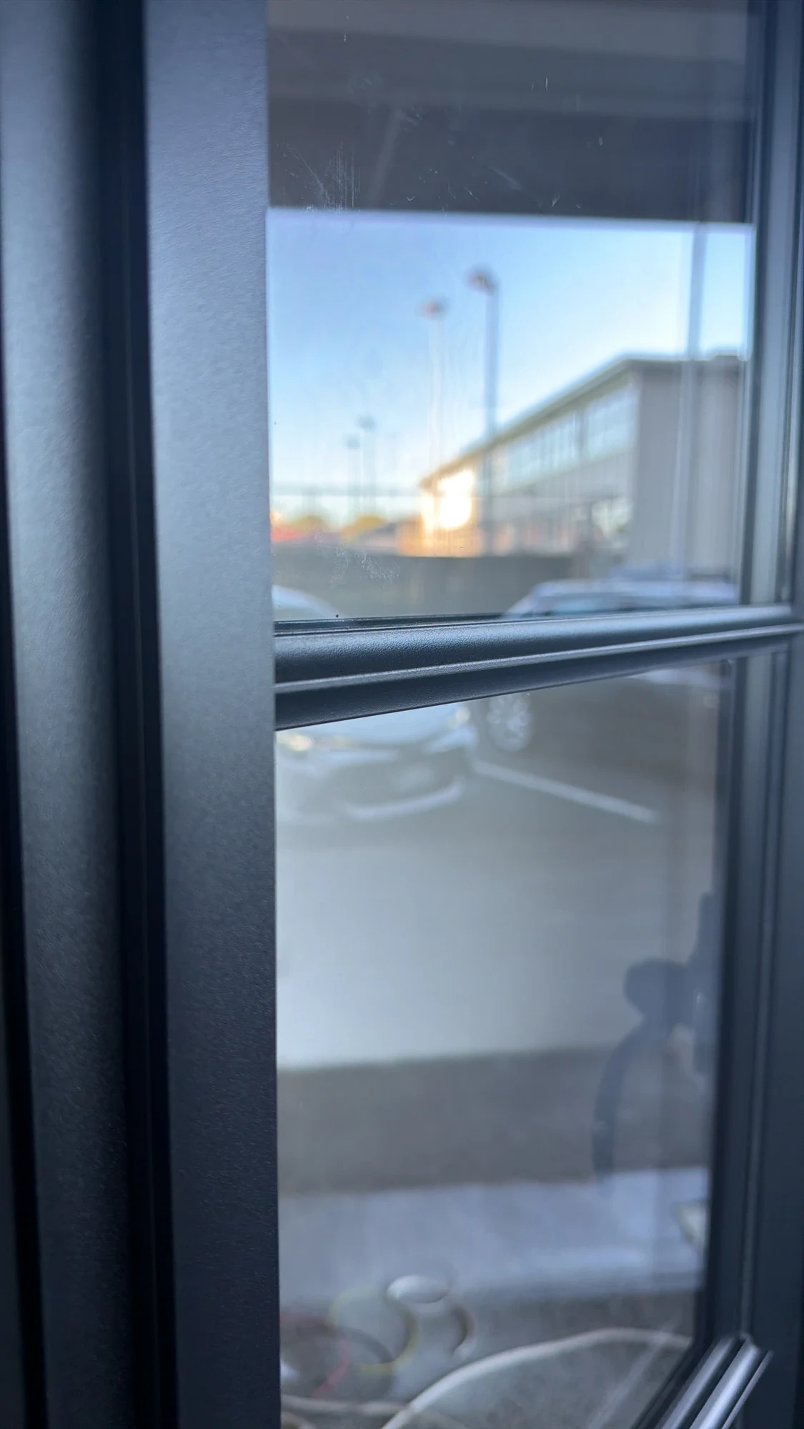 Slim Ridge divider bar — steel astragal on FerroFinestra frame